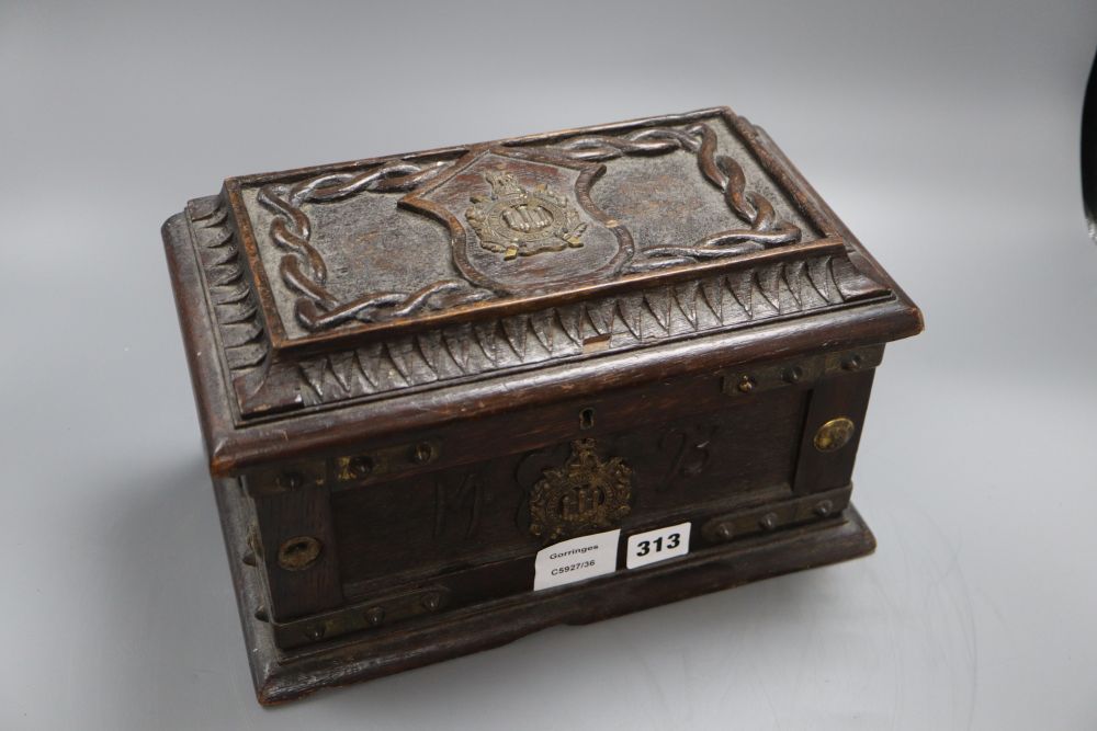 A brass bound wooden box, plaque to interior of lid reads made from oak, Old Parliament House, Edinburgh, 1493, length 30cm